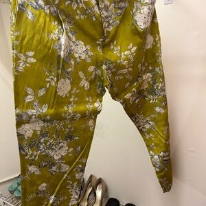 Anthropology green flowered brown slacks